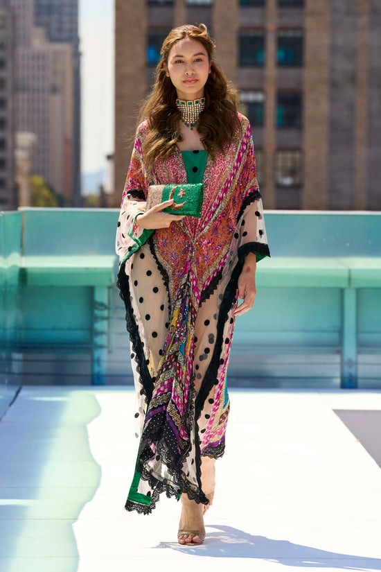 The kaftan that was everyone’s favorite! The moment the model tried it on the fitting day till the show, it was followed by many for details and availability. Drool worthy details, versatile chic look , embroidered accents and fabulous mix of color  
